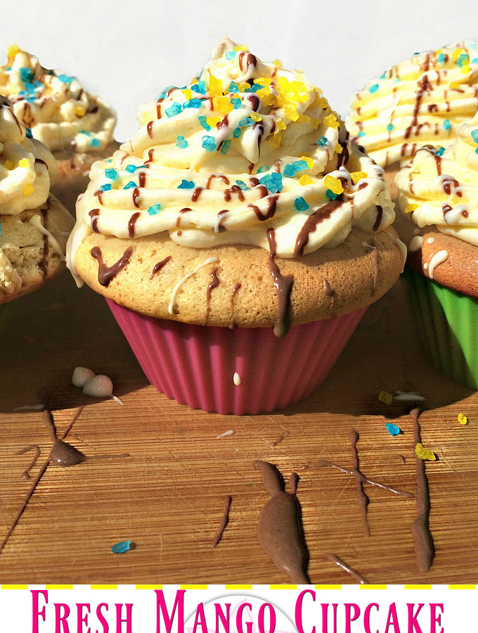 Fresh Mango Cupcake with Mango Frosting - Anna Can Do It! * Fresh Mango Cupcake with Mango Frosting is a rich vanilla cupcake with fresh mango pieces with luscious mango frosting. It's probably not my healthiest recipe, but believe me, worth to try it!